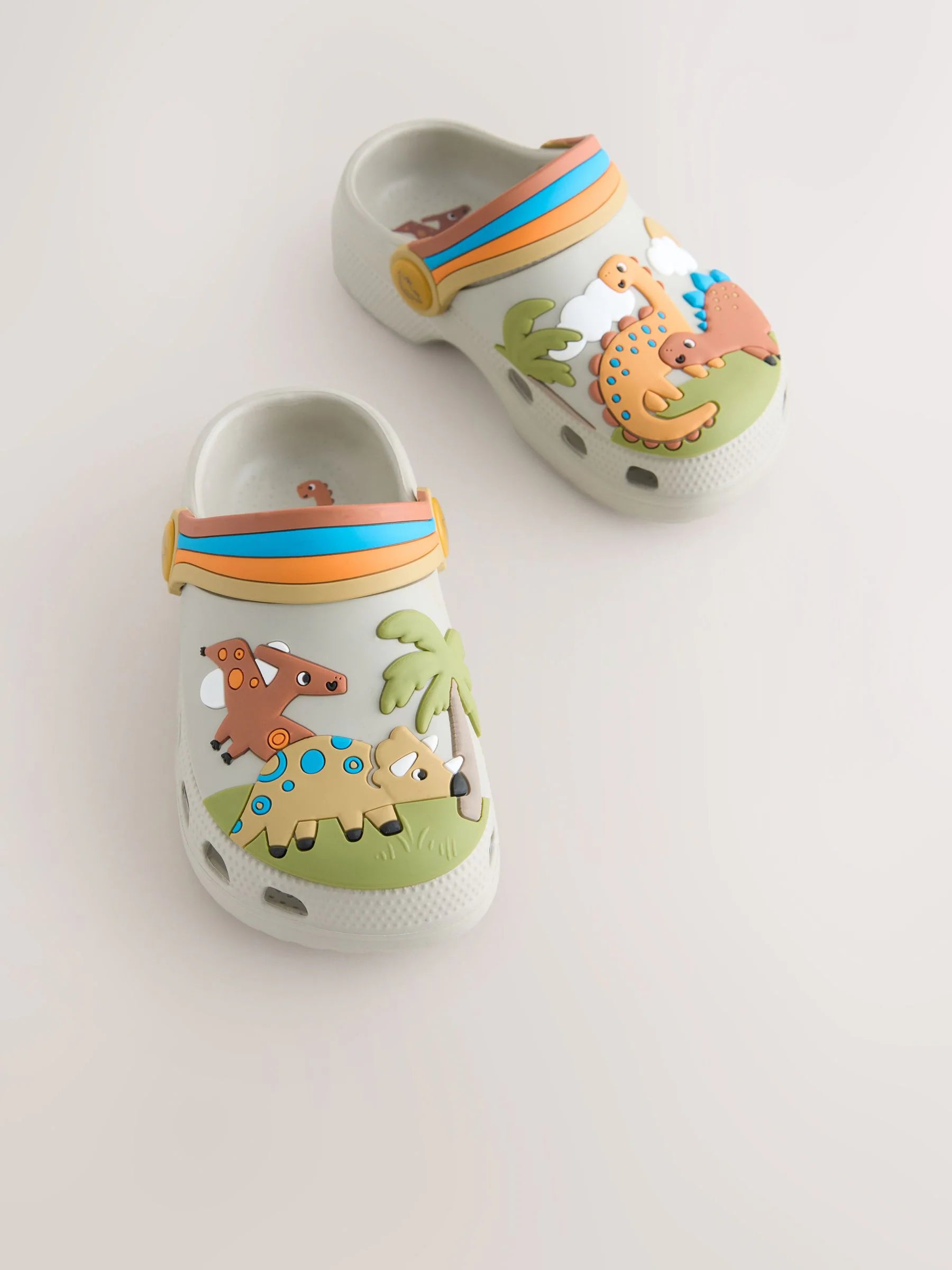 Neutral Dinosaur Print Scene Character Clogs