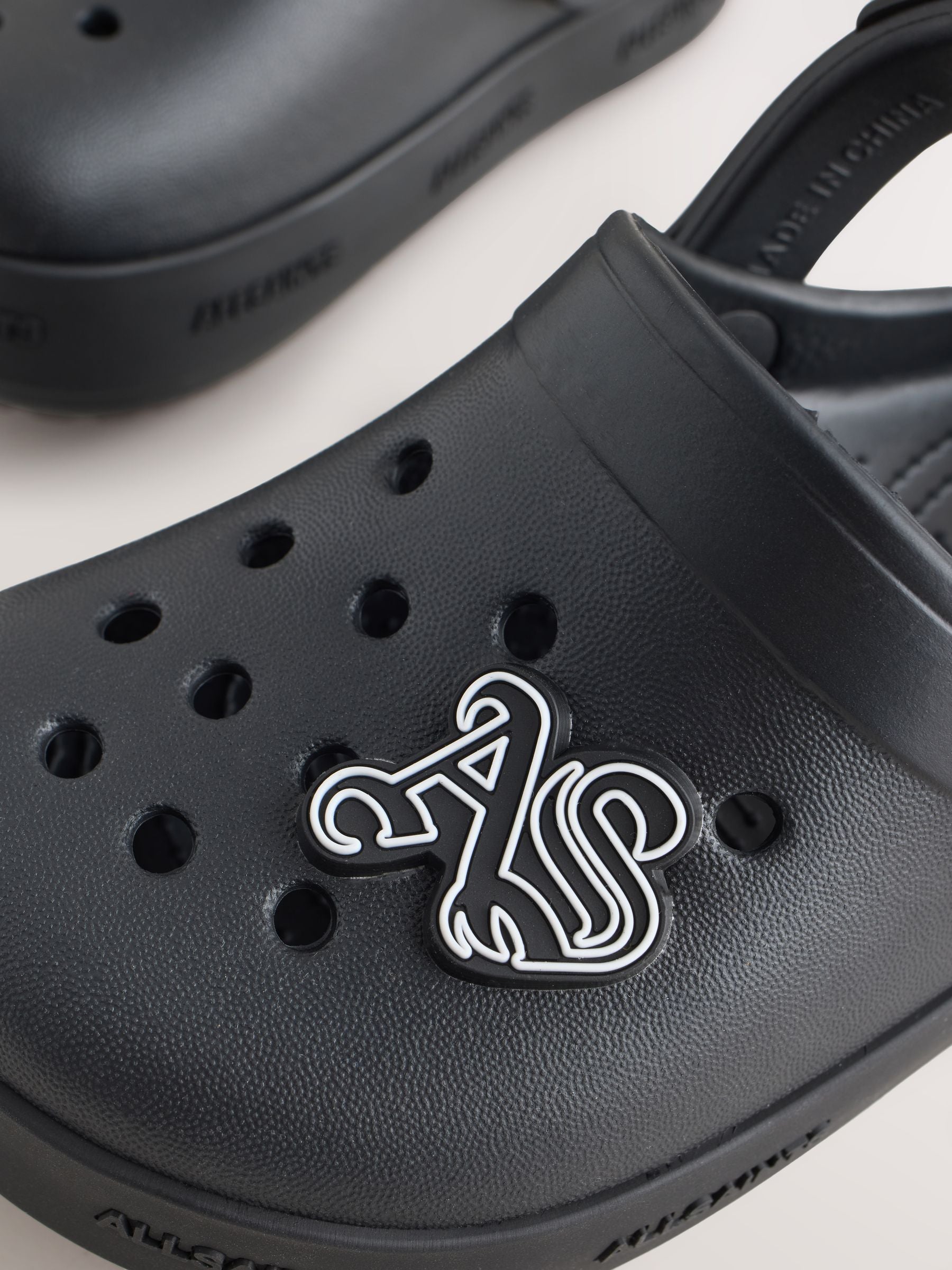 smallSAINTS Black Clog Sandals