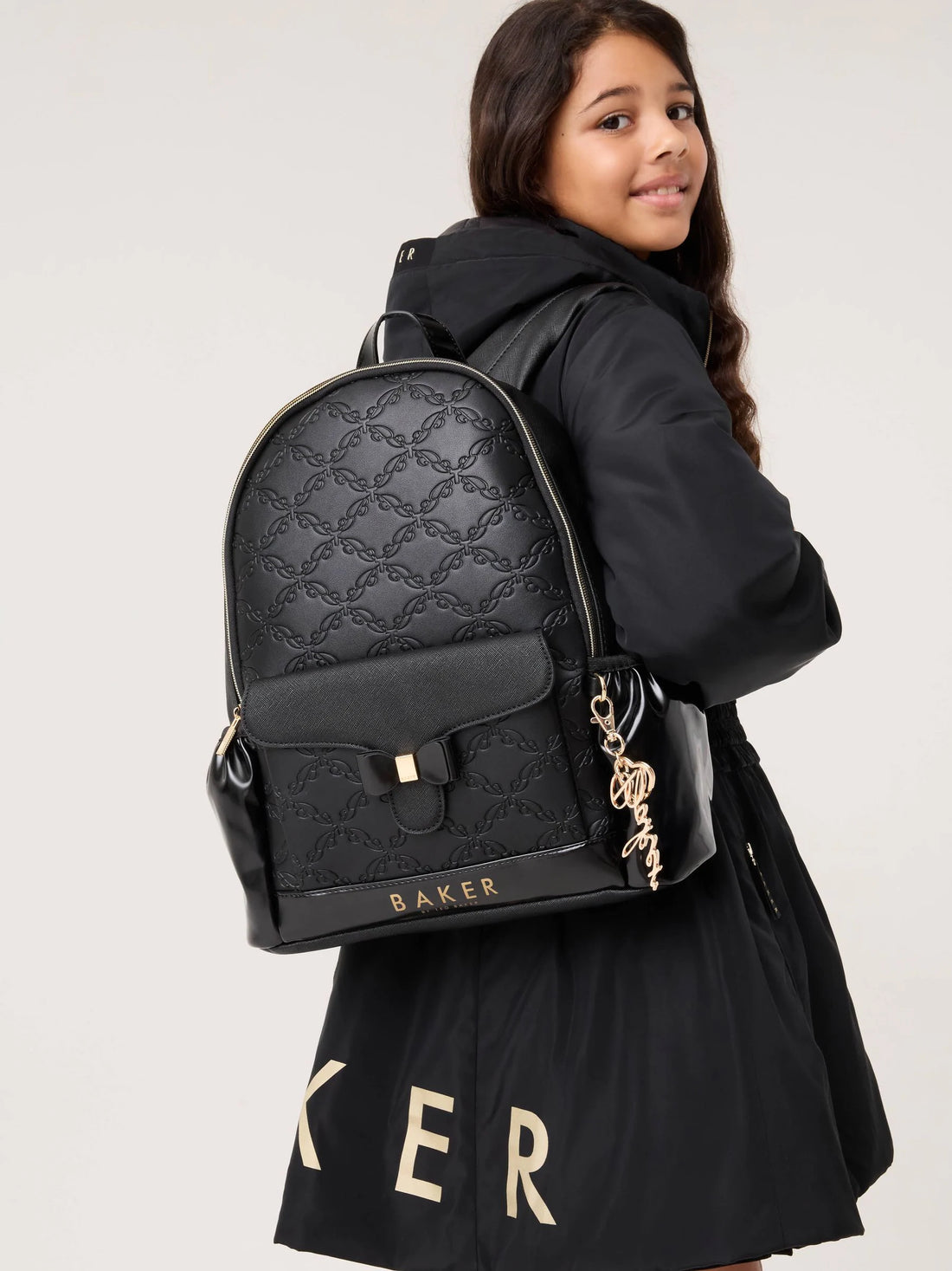 Baker by Ted Baker Black Back to School Childrens Embossed Bow Backpack