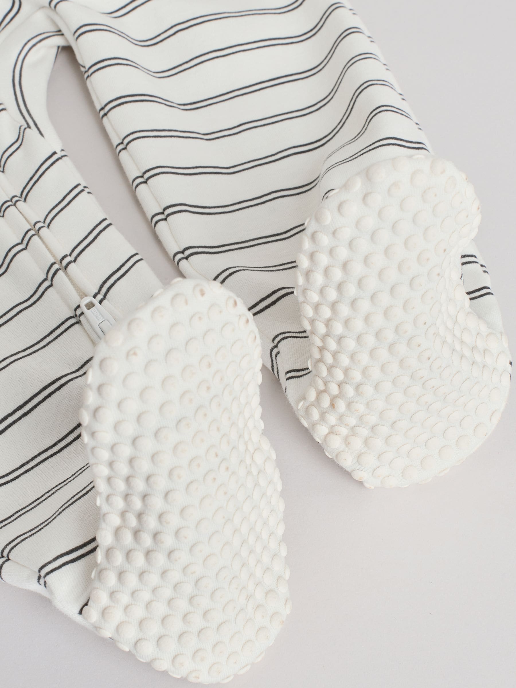 White/Black Two Way Zip Baby Sleepsuits 4 Pack