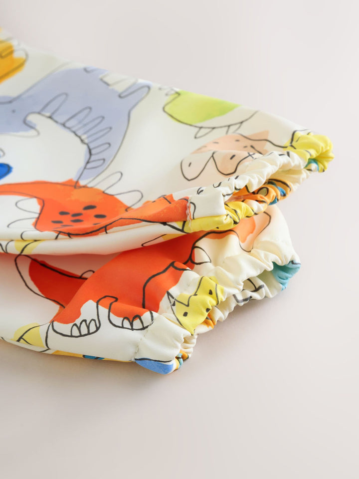 Blue Dinosaurs Weaning And Feeding Sleeved Bib