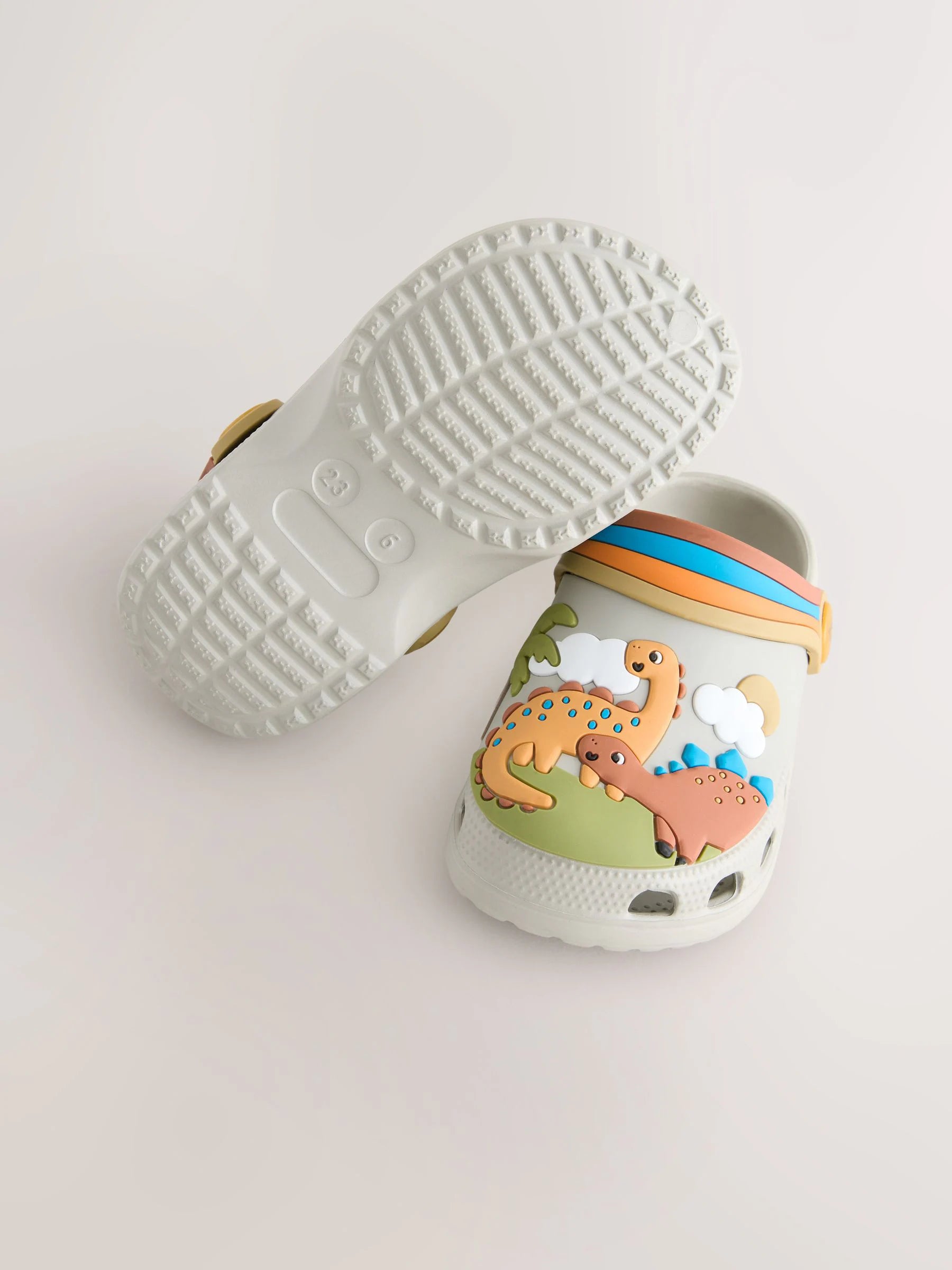 Neutral Dinosaur Print Scene Character Clogs